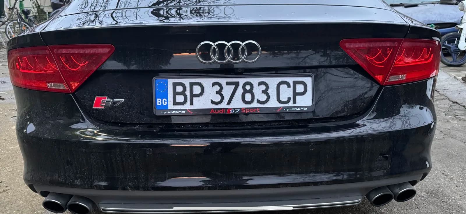 Custom license plate frame on a real customer's car from NameYourCar.store — UV print