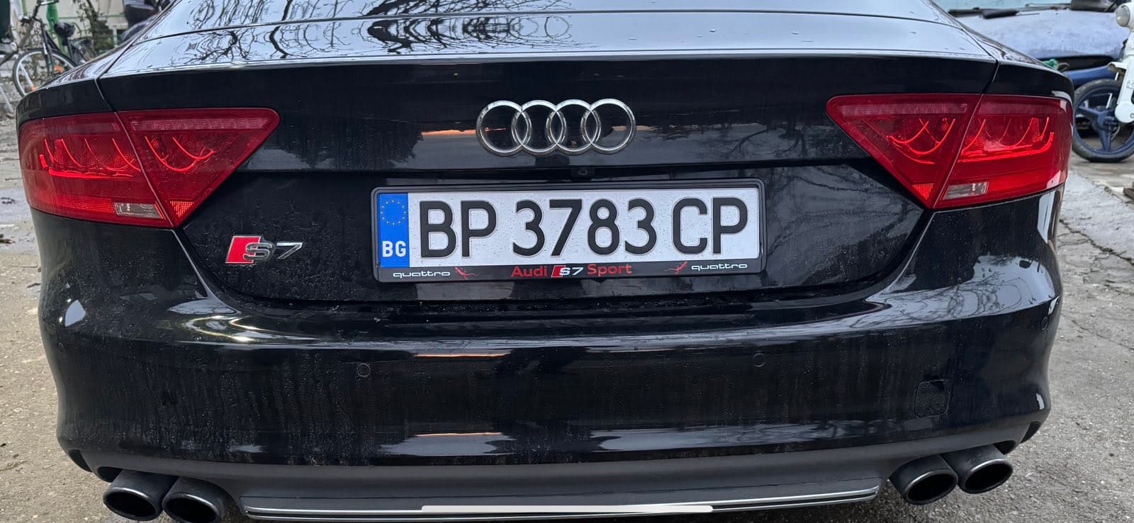 Custom license plate frame on a real customer's car from NameYourCar.store — UV print
