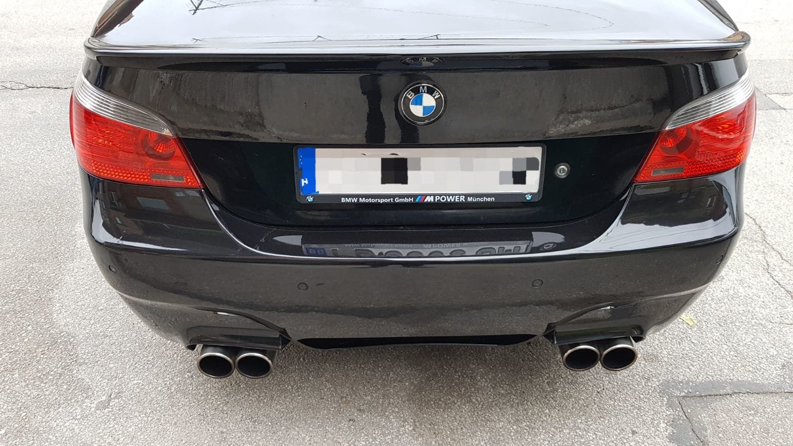 Custom license plate frame on a real customer's car from NameYourCar.store — UV print